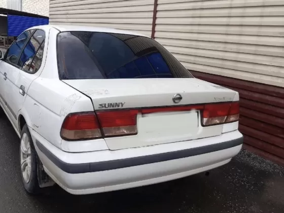 Купить Nissan Sunny 1495 см3 АКПП (105 л.с.) Бензин инжектор в Тамань: цвет Белый Седан 1998 года по цене 170000 рублей, объявление №24798 на сайте Авторынок23