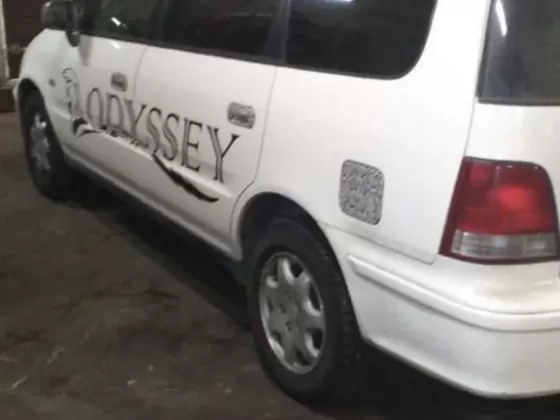 Купить Honda Odyssey 2300 см3 АКПП (150 л.с.) Бензин инжектор в Полтавская: цвет Белый Минивэн 1998 года по цене 285000 рублей, объявление №21274 на сайте Авторынок23