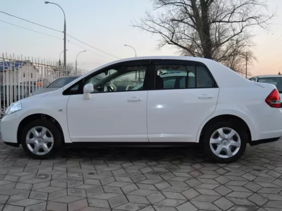 Купить Nissan Tiida 1500 см3 АКПП (109 л.с.) Бензин инжектор в Краснодар: цвет белый Седан 2010 года по цене 425000 рублей, объявление №644 на сайте Авторынок23