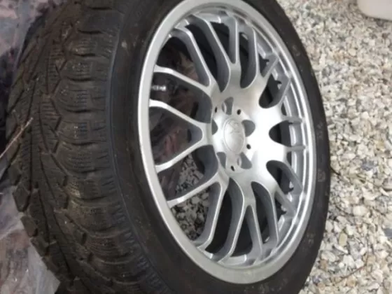 Комплект зимних шин с литыми дисками R18 на Ягуар